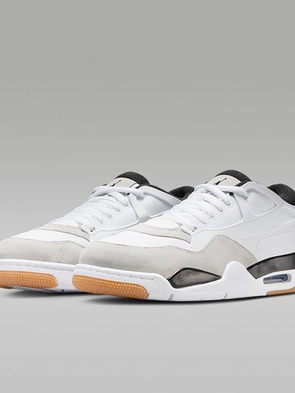 Brand New Air Jordan 4 RM Men's Shoes (Black/White) in the sneaker box.
